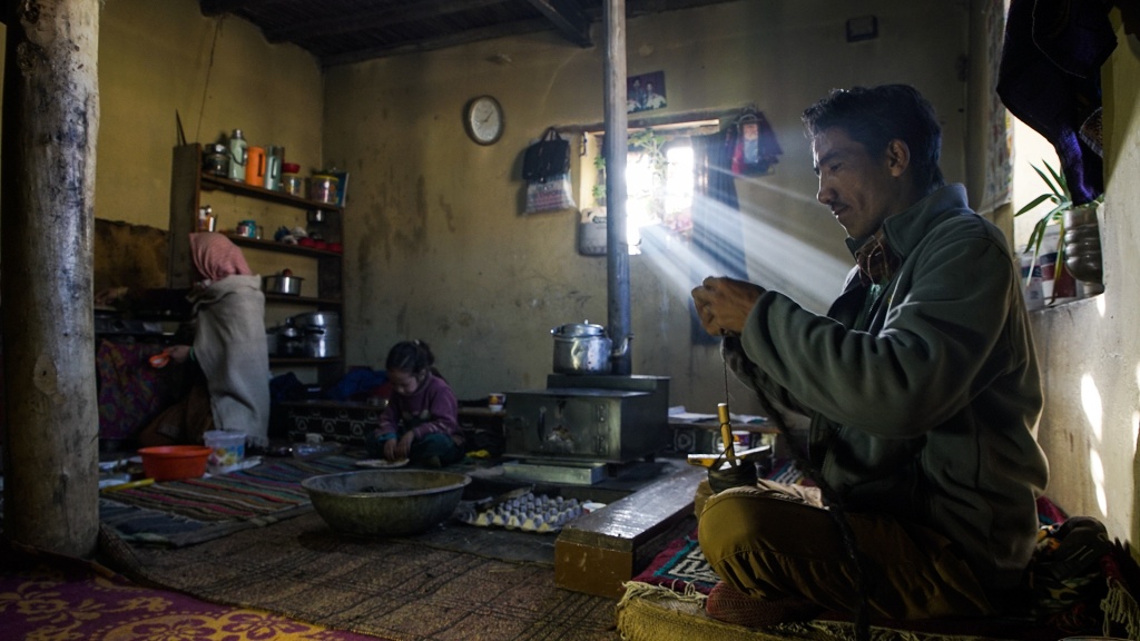 Families in the Spiti Valley usually huddle around the fireplace, called bukhari, for warmth during winter.